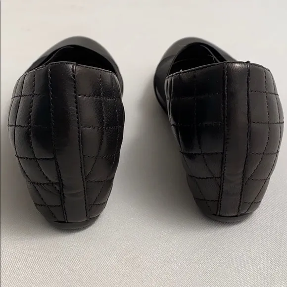 Aquatalia black quilted leather round toe wedge shoes