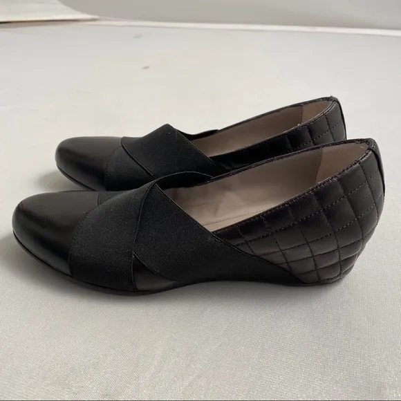 Aquatalia black quilted leather round toe wedge shoes
