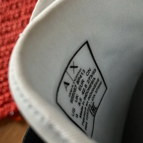 Armani Exchange Shoes. Size 9. Slip on sneakers.  Excellent preowned condition.