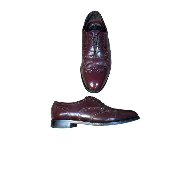 Florsheim 9.5 leather wing tip shoes