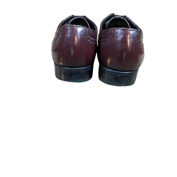 Florsheim 9.5 leather wing tip shoes