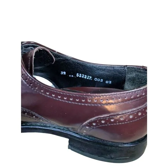 Florsheim 9.5 leather wing tip shoes