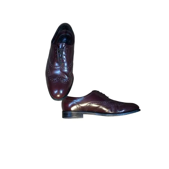 Florsheim 9.5 leather wing tip shoes