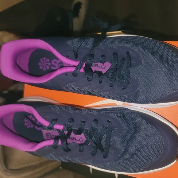 Nike Blue and Pink Athletic Shoes with Sleek Design