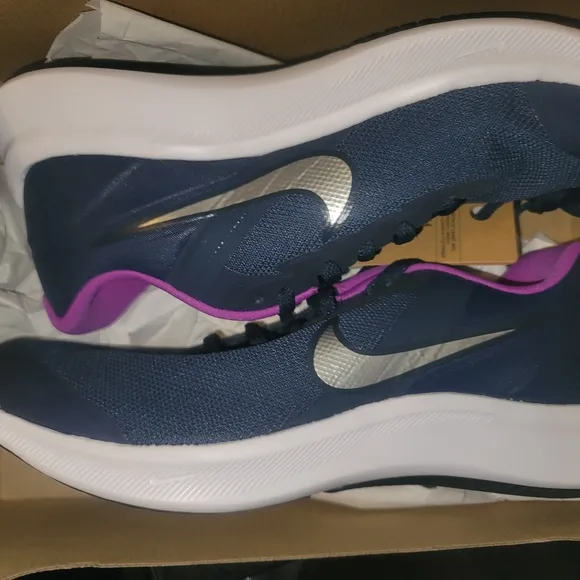 Nike Blue and Pink Athletic Shoes with Sleek Design