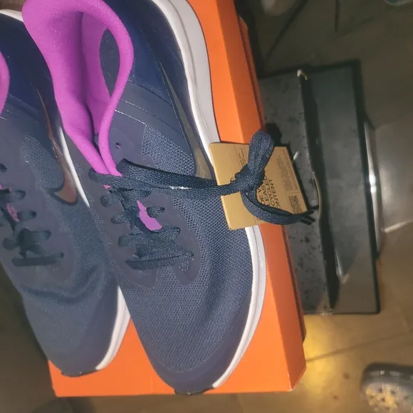 Nike Blue and Pink Athletic Shoes with Sleek Design