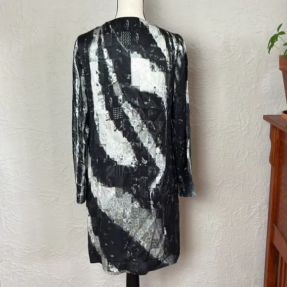 Unbreakable Evolution Collage Button Up Duster